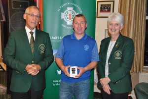 Stephen Galbraith (centre) is presented with his prize by St Patrick Golf Club Captains Brendan Mullen & Elizabeth Mageean